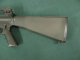 7281 Bushmaster AR 15 E2S, 223 cal fixed stock, 16 inch barrels 99% condition. super clean, pistol grip, one magazine. looks unfired. - 2 of 14