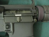7281 Bushmaster AR 15 E2S, 223 cal fixed stock, 16 inch barrels 99% condition. super clean, pistol grip, one magazine. looks unfired. - 10 of 14