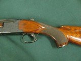 7292 Winchester 101 field 28 gauge 28 inch barrels cyclinder/skeet, 14 3/4 lop White line pad, light barrel markings, tiger stripe walnut, bores brite - 3 of 13