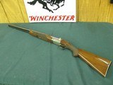 7298 Winchester 23 Pigeon XTR 12 gauge 26 inch barrels ic/mod, 2 3/4 & 3 inch chambers, round knob long tang, 2 white beads, Winchestor butt pad. all - 1 of 13