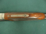 7298 Winchester 23 Pigeon XTR 12 gauge 26 inch barrels ic/mod, 2 3/4 & 3 inch chambers, round knob long tang, 2 white beads, Winchestor butt pad. all - 11 of 13