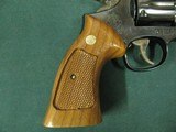 7301 Smith Wesson 14-4 38 special 8 3/8 inch barrel, adjustable rear site, medallion grips of walnut.NOt a mark on it. As new in box, papers tool and - 7 of 10