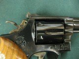 7301 Smith Wesson 14-4 38 special 8 3/8 inch barrel, adjustable rear site, medallion grips of walnut.NOt a mark on it. As new in box, papers tool and - 8 of 10