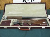 7320 Winchester 101 25th SILVER ANNAVERSARY EDITION ONLY 101 MFG THIS IS #40. full leather burgundy case,silver snaps, AAA++Fancy HIGHL FIGURED WALNUT - 2 of 18
