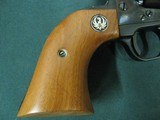 7323 Ruger Blackhawk 357 Magnum 4 1/2 inch barrel, flat top, protected rear adjustable site, wood medallion grips, 99% condition, this is the old 3 sc - 6 of 9