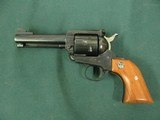 7323 Ruger Blackhawk 357 Magnum 4 1/2 inch barrel, flat top, protected rear adjustable site, wood medallion grips, 99% condition, this is the old 3 sc - 2 of 9