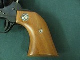 7323 Ruger Blackhawk 357 Magnum 4 1/2 inch barrel, flat top, protected rear adjustable site, wood medallion grips, 99% condition, this is the old 3 sc - 3 of 9