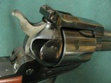 7323 Ruger Blackhawk 357 Magnum 4 1/2 inch barrel, flat top, protected rear adjustable site, wood medallion grips, 99% condition, this is the old 3 sc - 9 of 9
