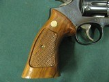 7325 Smith Wesson 48-2 MASTERPIECE 22 mrf(mag) 6 inch barrel, target rear adjustable site,grooved trigger, stippled hammer,99% conditon.Wood m - 5 of 9