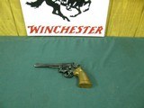7325 Smith Wesson 48-2 MASTERPIECE 22 mrf(mag) 6 inch barrel, target rear adjustable site,grooved trigger, stippled hammer,99% conditon.Wood m - 1 of 9