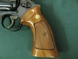 7325 Smith Wesson 48-2 MASTERPIECE 22 mrf(mag) 6 inch barrel, target rear adjustable site,grooved trigger, stippled hammer,99% conditon.Wood m - 2 of 9