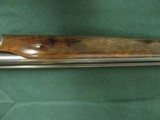 7342 Parker reproduction
by Winchester DHE 28 gauge 26 inch barrels Q1/Q2 fixed chokes, straight grip, skelton butt, single front bead 99%, silver sn - 15 of 16