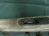 7352 Savage Mark II 22 long rifle, grey laminate stock, 3x9x45 Bushnell scope, 99.9% condition, medium weight barrel, not a mark on it. dont miss this - 11 of 13