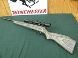 7352 Savage Mark II 22 long rifle, grey laminate stock, 3x9x45 Bushnell scope, 99.9% condition, medium weight barrel, not a mark on it. dont miss this - 1 of 13