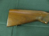 7353 Ruger 10/22 22 long rifle, early good one, all original, 97%, rotary mag, butt plate broken mid sitge, 10 inch barrel - 8 of 11