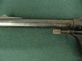 7345 High StandardR101 22 cal revolver, 9 shot, with holster, works fine, oil on cyclinder not rust. - 5 of 12