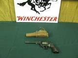 7345 High StandardR101 22 cal revolver, 9 shot, with holster, works fine, oil on cyclinder not rust. - 1 of 12