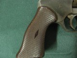 7345 High StandardR101 22 cal revolver, 9 shot, with holster, works fine, oil on cyclinder not rust. - 7 of 12