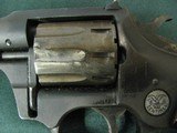 7345 High StandardR101 22 cal revolver, 9 shot, with holster, works fine, oil on cyclinder not rust. - 4 of 12