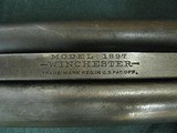 7406 Winchester 1897 12 gauge 30 inch barrel full, Winchester butt plate, bores brite and shiny, tite action. hammer is strong, pump action is tite.re - 11 of 12