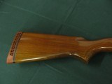 7410 Remington Wingmaster 870 12 gauge 20 inch barrel 2 3/4 chamber, butt pad, all original, choke is improved cyclinder, pump action, tite, bore brit - 9 of 11