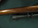 7432 Winchester 43 218 B 24 inch barrel hooded front site, steel butt plate,Burris 3x9 scope, strap, 2 boxes of shells, original side mount lyman peep - 11 of 13