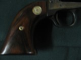 7439 Colt Peacekeepe 22 long rifle and 22 magnum. 2 cylinders, case colored frame, wood grips with Colt Medallions 98% condition, indexes and is tite, - 8 of 11