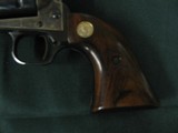 7439 Colt Peacekeepe 22 long rifle and 22 magnum. 2 cylinders, case colored frame, wood grips with Colt Medallions 98% condition, indexes and is tite, - 7 of 11