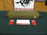 7446 Winchester 101 Pigeon LIGHTWEIGHT BABY FRAME 28 GAUGE, 28inch barrels, sk 2ic 2m f, wrench 2 pouches,keys,Winchester brochure, vent rib, all orig - 1 of 18