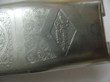 7470 Winchester 101 Diamond Grade
skeet,12 gauge 27 1/2 bls all original,98% condition with correct Winchester Diamond Grade case.Diamond engraved pa - 13 of 16