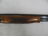 7493 Browning Citori SUPERLIGHT 16 gauge 26 inch barrels.8 screw in chokes,STRAIGHT GRIP, front brass bead, the early good one,Browning butt plate, 99 - 7 of 12