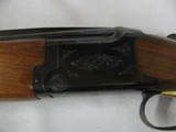 7493 Browning Citori SUPERLIGHT 16 gauge 26 inch barrels.8 screw in chokes,STRAIGHT GRIP, front brass bead, the early good one,Browning butt plate, 99 - 12 of 12