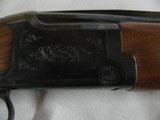 7493 Browning Citori SUPERLIGHT 16 gauge 26 inch barrels.8 screw in chokes,STRAIGHT GRIP, front brass bead, the early good one,Browning butt plate, 99 - 11 of 12