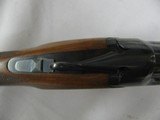 7493 Browning Citori SUPERLIGHT 16 gauge 26 inch barrels.8 screw in chokes,STRAIGHT GRIP, front brass bead, the early good one,Browning butt plate, 99 - 8 of 12