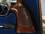 7500 Smith Wesson 19-4 357 Magnum 6 inch nickel 99% condition,medallion walnut grips, wood presentation box with tools, S/W box with end label and pap - 4 of 10
