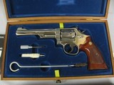 7500 Smith Wesson 19-4 357 Magnum 6 inch nickel 99% condition,medallion walnut grips, wood presentation box with tools, S/W box with end label and pap - 2 of 10