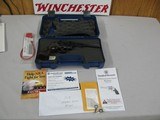 7505 Smith Wesson 17-9 22 long rifle 6 inch barrel 99% unfired as new in box, slightest of ring, mfg 2009 papers keys walnut medallions, adjustable re - 3 of 12