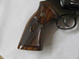 7505 Smith Wesson 17-9 22 long rifle 6 inch barrel 99% unfired as new in box, slightest of ring, mfg 2009 papers keys walnut medallions, adjustable re - 11 of 12