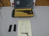 7506 Smith Wesson 41 22 long rifle 99% semi auto ANIB paper, 2 magazines, correct blue box, mfg 79-80.walnut grips adjustable rear site,- - 3 of 10