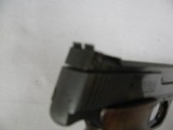 7506 Smith Wesson 41 22 long rifle 99% semi auto ANIB paper, 2 magazines, correct blue box, mfg 79-80.walnut grips adjustable rear site,- - 8 of 10