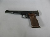 7506 Smith Wesson 41 22 long rifle 99% semi auto ANIB paper, 2 magazines, correct blue box, mfg 79-80.walnut grips adjustable rear site,- - 4 of 10