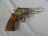 7511 Smith Wesson 57 41 magnum 4 inch barrel (hard to find) mfg 1981 wood presentation case, all papers and tools,walnut medallion grips NICKE - 3 of 11