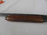 7517 Remington 1100 20 gauge 28 inch barrel mod, oil finish walnut stock,this is the early good one,single front brass bead, white diamond in pistol g - 4 of 11