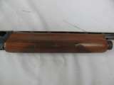 7517 Remington 1100 20 gauge 28 inch barrel mod, oil finish walnut stock,this is the early good one,single front brass bead, white diamond in pistol g - 9 of 11