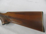 7517 Remington 1100 20 gauge 28 inch barrel mod, oil finish walnut stock,this is the early good one,single front brass bead, white diamond in pistol g - 2 of 11