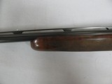 7518 Winchester 23 Classic 410 gauge 26 inch barrels mod/full, pistol grip with cap, vent rib single select trigger, ejectors.Winchester butt pad. ALL - 12 of 14