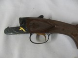7521 Winchester 23 CLASSIC HUNT SET 28GA/20GA, S/N WBS 46 . 26 inch barrels, ic/mod, vent rib, pistol grip, ejectors, gold raised relief Pheasant on 2 - 4 of 15