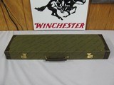 7570 Winchester 23 Classic 410 gauge 26 inch barrels, mod and full, gold raised relief Quail on bottom of receiver, vent rib, pistol grip with cap, AA
