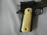 7560 Colt MarkIV 1911 Series 70 GOLD CUP NATIONAL MATCH 45 cal
faux ivory grips, adjustable rear site, 99% condition.--210 602 6360-- - 7 of 9