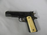 7560 Colt MarkIV 1911 Series 70 GOLD CUP NATIONAL MATCH 45 cal
faux ivory grips, adjustable rear site, 99% condition.--210 602 6360-- - 3 of 9